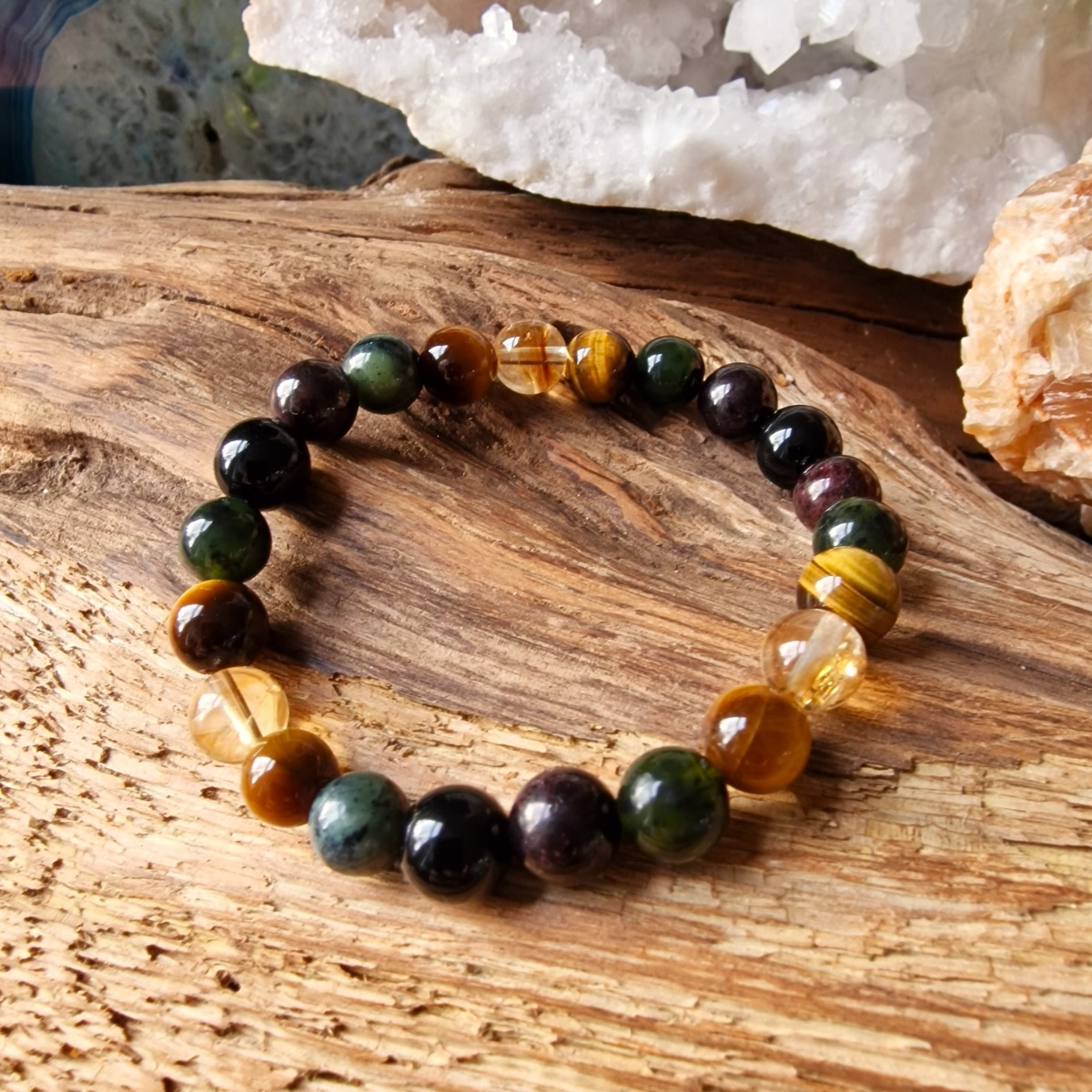 This high-vibrational crystal bracelet was specifically designed to help you prosper with the healing vibrations of citrine, tiger's eye, Jade, Garnet and obsidian