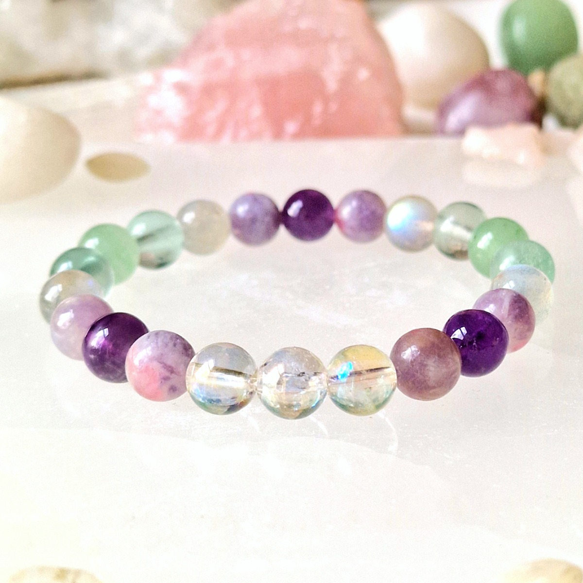 Pure Crystal's Ultimate healing crystal bracelet is designed to energise your intentions, sharpen your mind, and achieve inner peace. High-vibrational crystals: Aura Quartz, Labradorite, Amethyst, Pink Tourmaline, Aventurine and Fluorite.